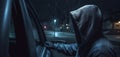 Thief wearing balaclava tries to break into car at night. Car thief is trying to break into and get inside the car. Generative AI