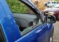 Thiefs have broken a car window to steel items Royalty Free Stock Photo