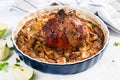 Thigh turkey baked in oven with spices and apples.