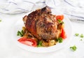 Thigh turkey baked in oven with spices and apples.