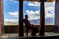 Monk resting in Thikse gompa in Ladakh region, India