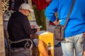 Budapest, Hungary - Thimble rigger counting his winnings