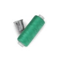Thimble and spool of green sewing thread isolated on white, top view Royalty Free Stock Photo