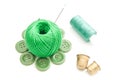 Thimbles, needles and green thread on white Royalty Free Stock Photo
