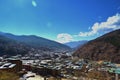 Top view of the densely packed dwellings down the hill in the valley of Thimphu