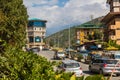 Thimphu, Bhutan - October 28, 2021: Street view Thimphu. Traditional architecture in the Bhutanese city. Cars driving on the