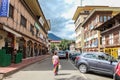 Thimphu, Bhutan - September 11, 2016: Street view of Thimphu with a Caucasian tourist walking alone, Bhutan