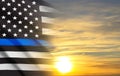 Thin Blue Line. American flag with police blue line on a background of sunset. Support of police and law enforcement Royalty Free Stock Photo