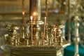 thin candles burn in the orthodox church