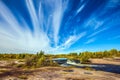Thin clouds over Winnipeg River Royalty Free Stock Photo