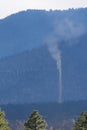 Thin column of smoke at the Schultz Fire near Flagstaff, Arizona.