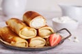 Thin crepe pancake rolls stuffed with cottage cheese