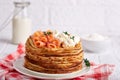 Thin crepe pancakes with salmon fish, cream cheese and thyme. Crepe week.