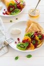 Thin crepes with fresh kiwi, orange, sicilian orange, honey, cream and mint leaves