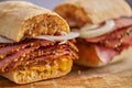 Thin cut pastrami sandwhich with delicious meet on baguette bread with chedder cheese, onion Royalty Free Stock Photo