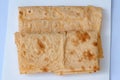 Thin folded Armenian lavash with paprika view from above. Royalty Free Stock Photo