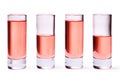 Thin glasses with pink liquid