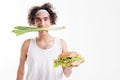 Thin guy sitting on vegetable diet