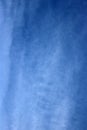 Thin high altitude clouds against a blue sky Royalty Free Stock Photo