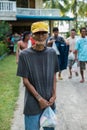 Thin man with food aid - earthquake victim