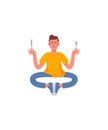 A thin man in a pose of meditation with a fork and a knife in his hands. A man meditates before eating