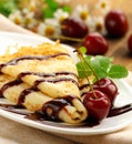 Thin pancake with chocolate syrup Royalty Free Stock Photo