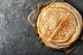 Thin pancakes or russian blini on gray background. Generative AI Royalty Free Stock Photo