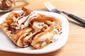 Thin pancakes served with chocolate syrup Royalty Free Stock Photo