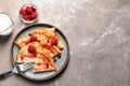 Thin pancakes served with syrup and berries Royalty Free Stock Photo