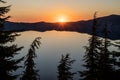 Thin Pine Tree Tops Droop From Weight At Sunset Over Crater Lake Royalty Free Stock Photo