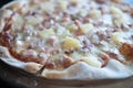 Thin pizza with ham and pineapples Royalty Free Stock Photo