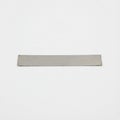 Thin Rectangular Strip of Brushed Metal on White Background Royalty Free Stock Photo