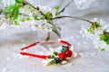 Thin red wreath with cherry blossom.