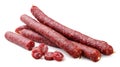 Thin sausage and sliced pieces on a white background. Isolated
