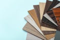 A thin sheaf of wood. Lots of samples. Interior design industry. Close up copy space Royalty Free Stock Photo