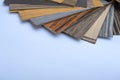 A thin sheaf of wood. Lots of samples. Interior design industry. Close up copy space. Royalty Free Stock Photo
