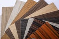 A thin sheaf of wood. Lots of samples. Interior design industry. Closeup with copy space.