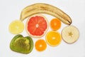 Thin slicing different fruits on white background