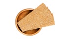 Thin slices of sourdough whole grain rye crispbread, in wooden bowl Royalty Free Stock Photo