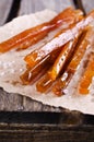 Thin sticks of smoked fish Royalty Free Stock Photo