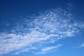 Thin white fluffly clouds in blue sky on sunny day Royalty Free Stock Photo