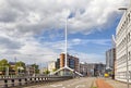 Thin white steeple on one of the crossroads of Eindhoven