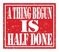 A THING BEGUN IS HALF DONE, text written on red stamp sign