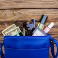 Things from open lady handbag Royalty Free Stock Photo