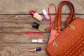 Things from open lady handbag. Royalty Free Stock Photo