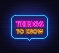 Things to Know neon sign in the speech bubble on brick wall background.