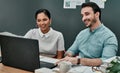 Things are turning out just as they wanted. two architects working together on a laptop in an office. Royalty Free Stock Photo