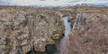 Thingvellir Iceland Rocky Landscape with Snow Covered Mountains