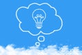 Think bulb speech bubble cloud shaped on blue sky Royalty Free Stock Photo
