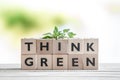 Think green sign with a plant Royalty Free Stock Photo